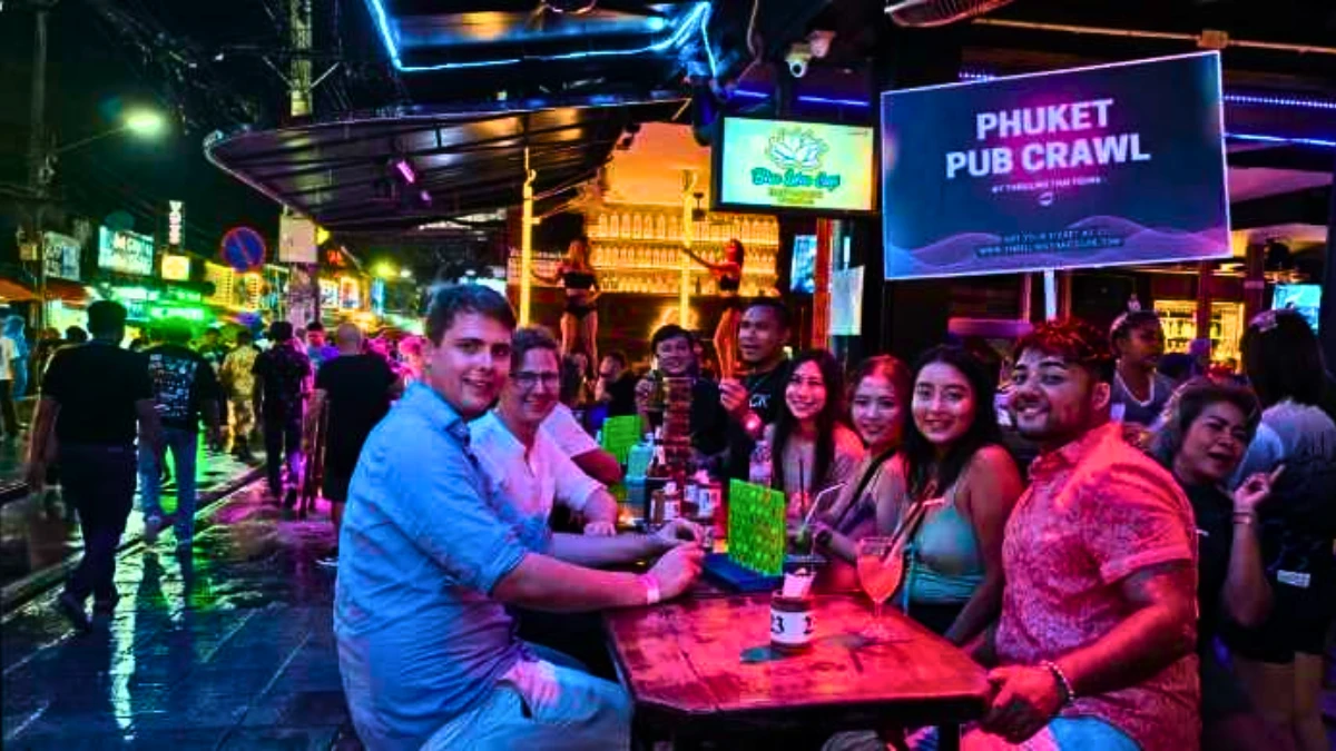 Undertake a bar crawl at the Bangla Road